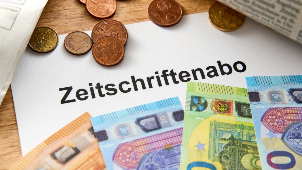 Geldscheine liegen auf einem Zettel mit der Aufschrift 